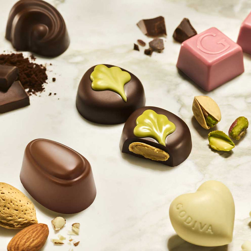 Assorted Godiva Gold Collection chocolates on a light background